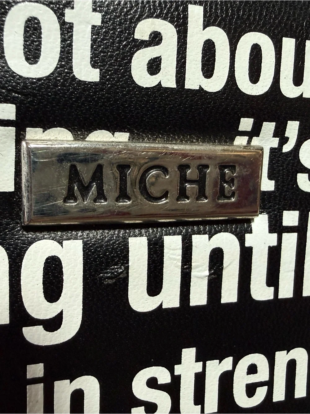 Miche Black and White Text Print Wallet with Silver Logo Plaque